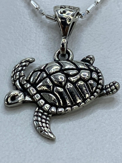 Dije tortuga en plata Taxco, detalle del Quinto 925 en la argolla