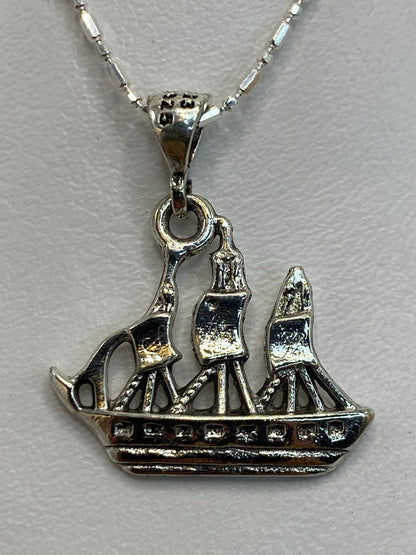 Dije de plata calado de Taxco .925, 2 cm, diseño geométrico cortado a mano