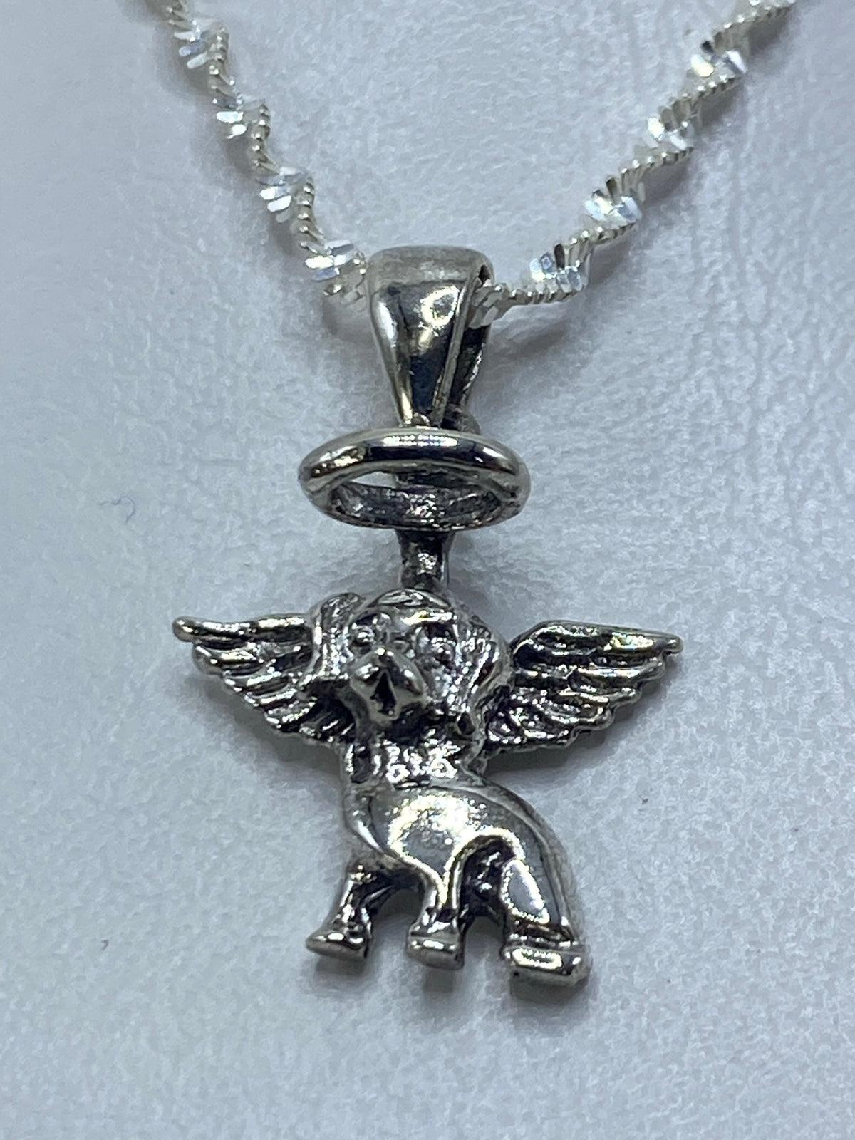 Dije elefante alado en plata .925 colgando de cadena plata