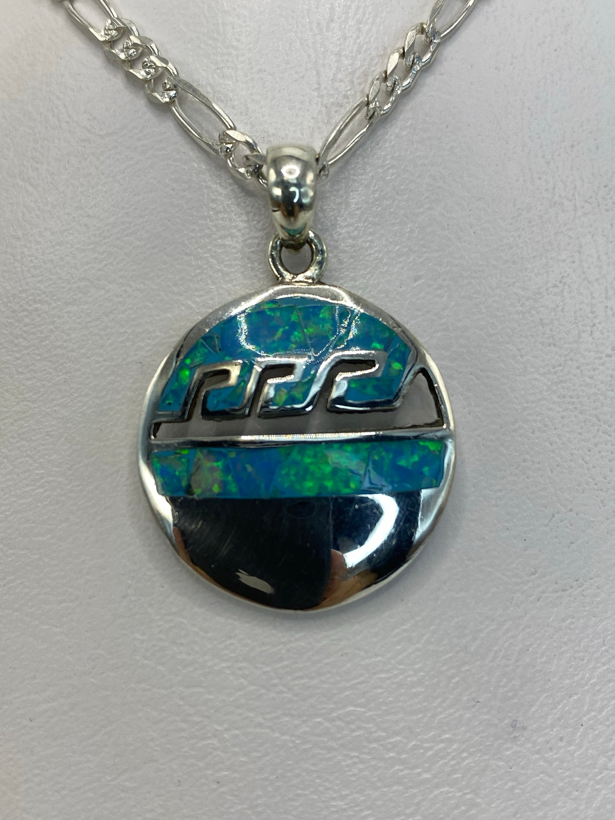 Dije de plata .950 con ópalo de fuego azul cielo, técnica combinada de Taxco