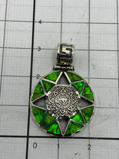 Reverso del dije prehispánico con Quinto .950 grabado