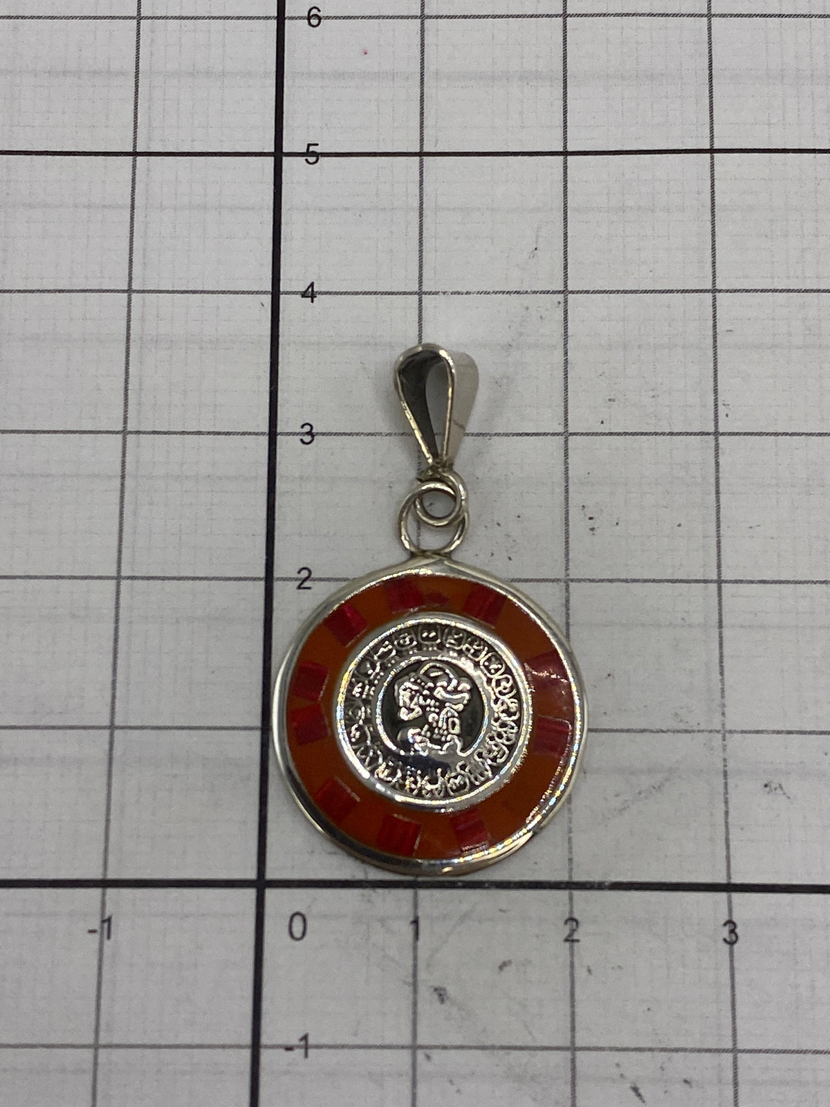 Reverso del dije con el sello MEXICO 925 grabado, confirmando la autenticidad