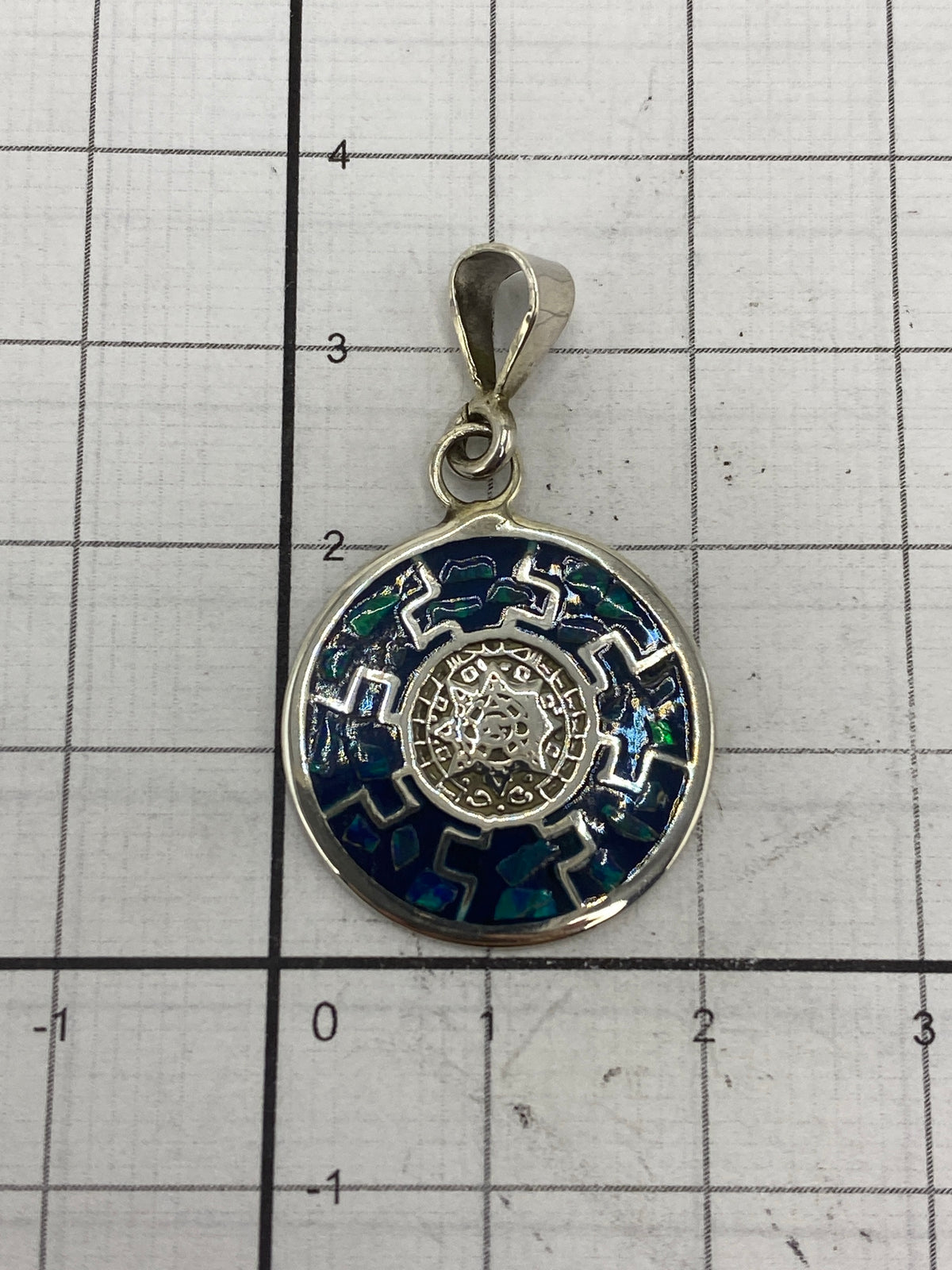 Reverso del dije con el Quinto 925 y marca de Arte Taxco México