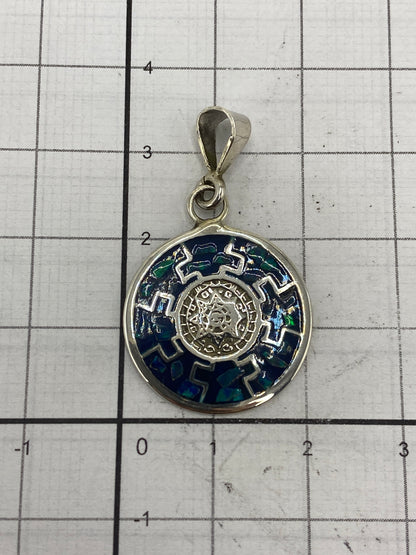 Reverso del dije con el Quinto 925 y marca de Arte Taxco México