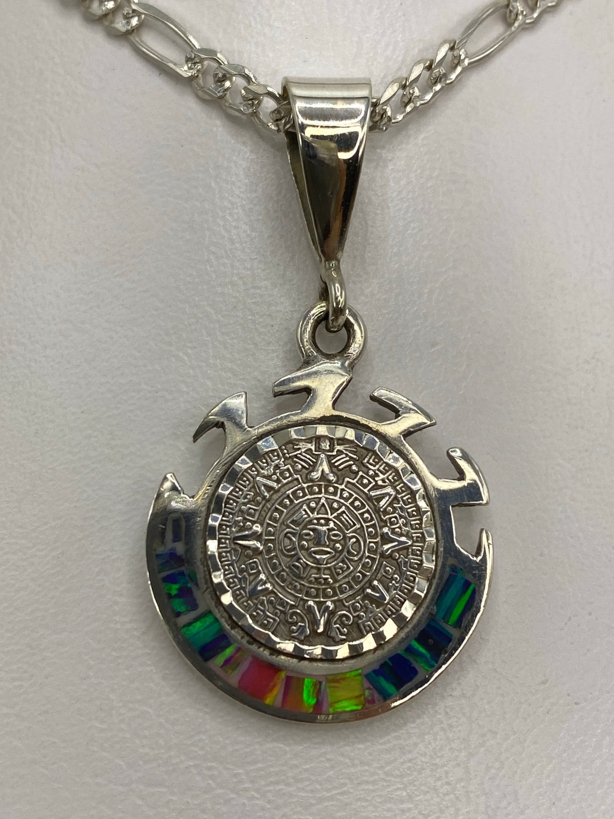 Reverso del dije mostrando el Quinto 950 y MEXICO TAXCO