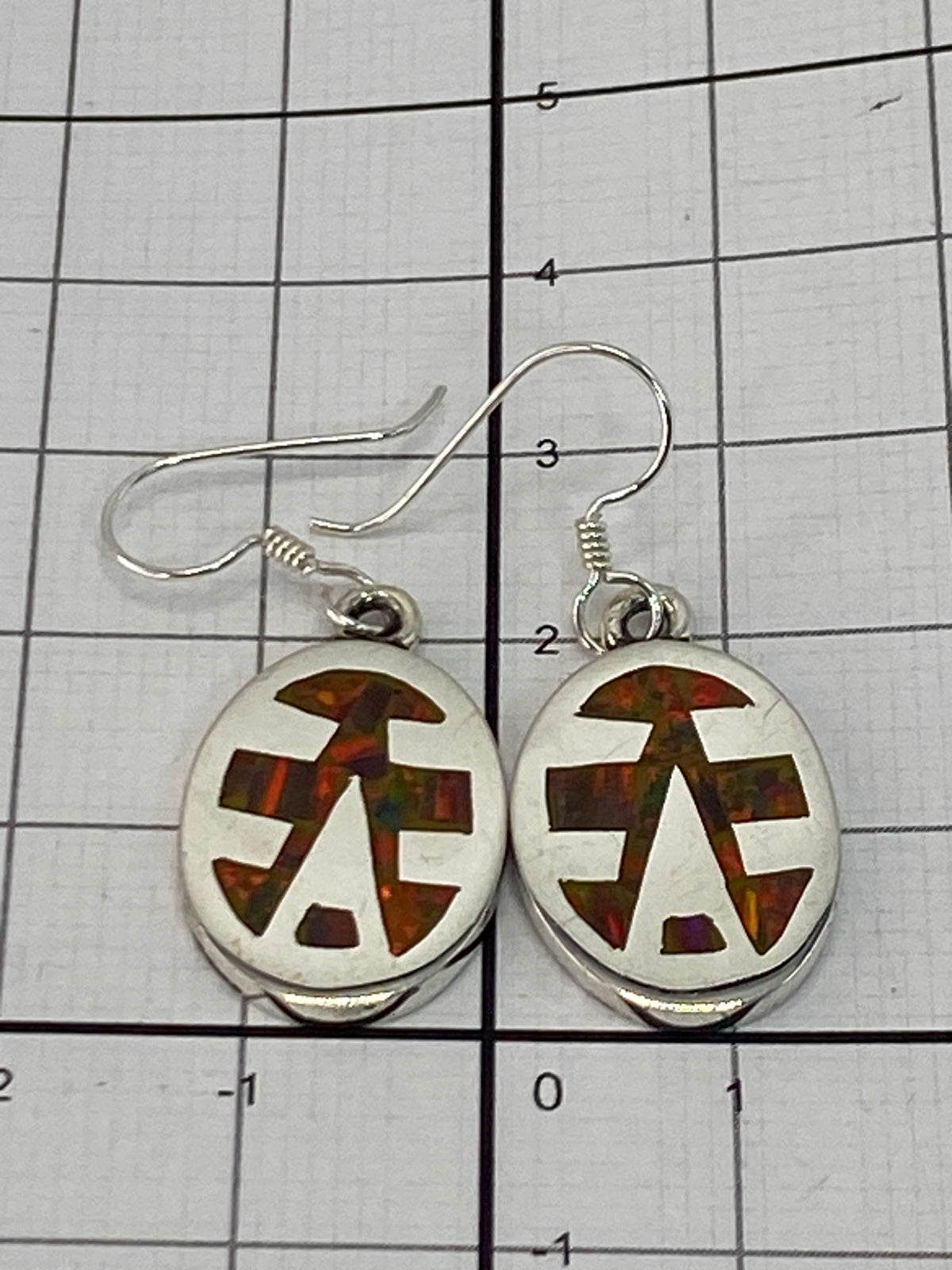Certificado de autenticidad del par de aretes de plata 950 con Quinto grabado