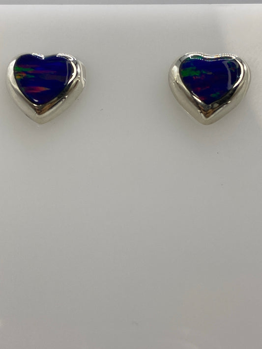 Detalle del engaste a mano del ópalo morada en plata 925
