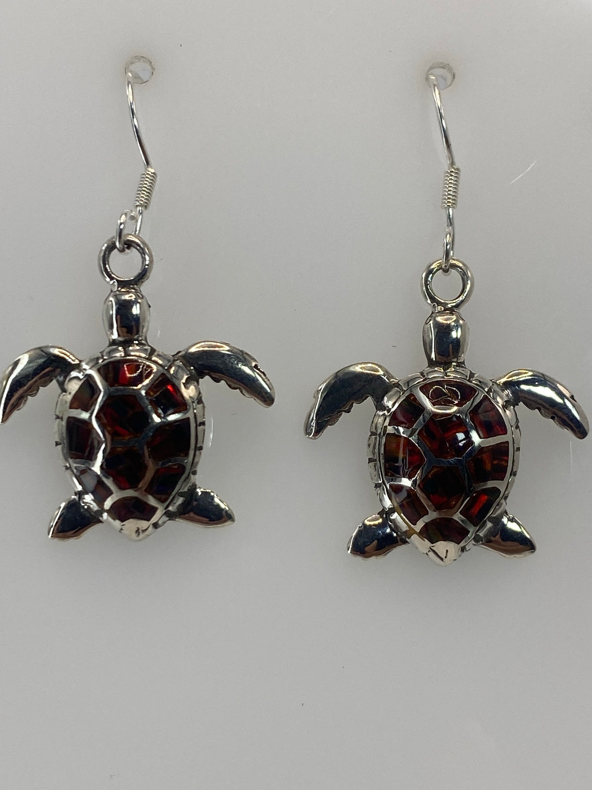Medida comparativa en regla: aretes de 3.3 cm de largo