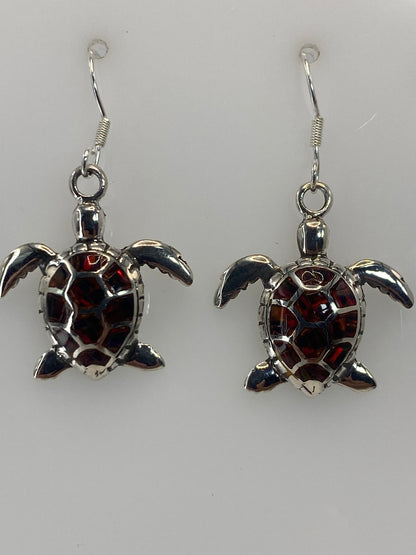 Medida comparativa en regla: aretes de 3.3 cm de largo
