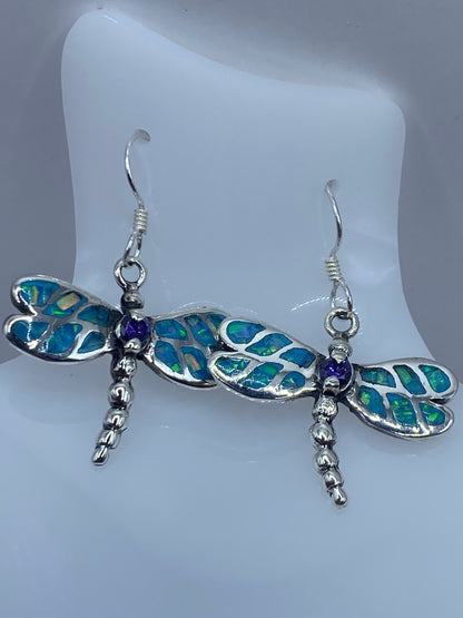 Par de aretes de plata 950 con ópalo de fuego azul cielo engastado a mano