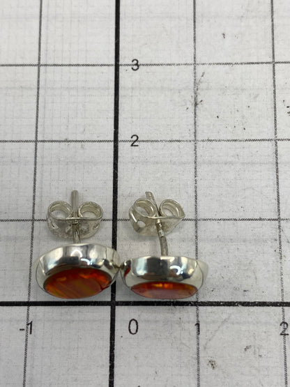 Aretes de plata 925 con Ópalo de Fuego en su empaque de certificado