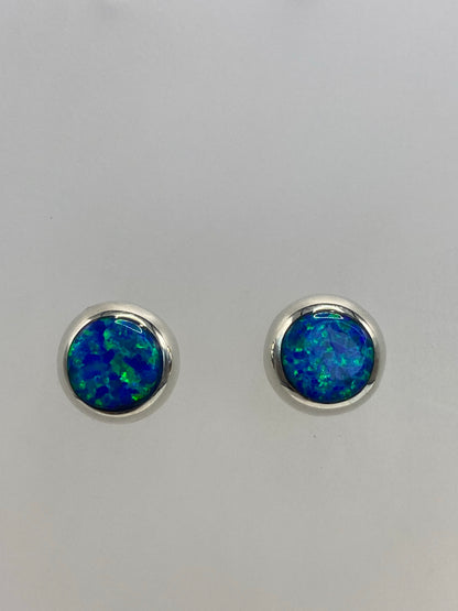 Par de aretes de plata 925 con ópalo de fuego azul cielo engastado a mano