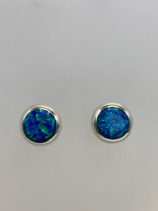 Par de aretes de plata 925 con ópalo de fuego azul cielo engastado a mano