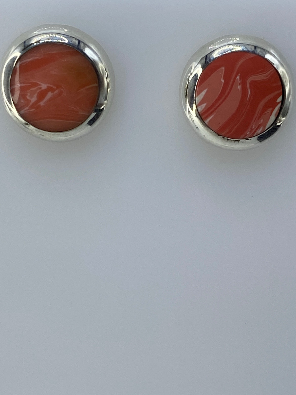 Aretes de plata Taxco sobre fondo blanco, mostrando el Quinto 925