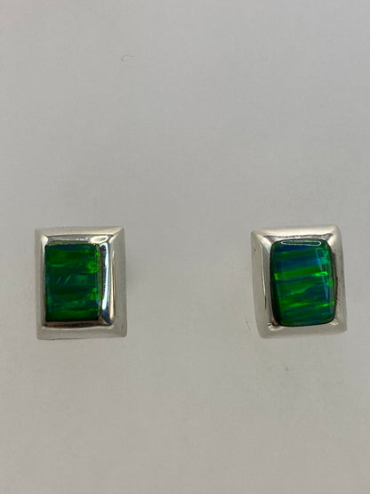 Detalle del engaste a mano y la plata 925 con Quinto en cada arete