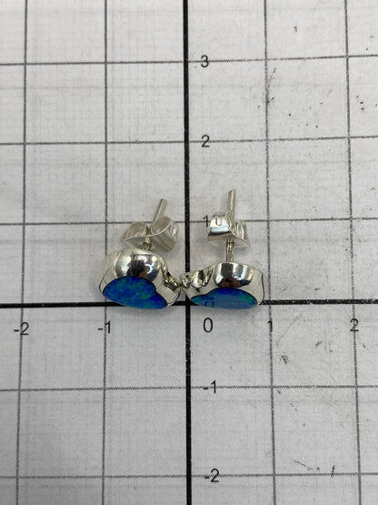 Aretes de ópalo en plata 925 mostrando el Quinto de autenticidad