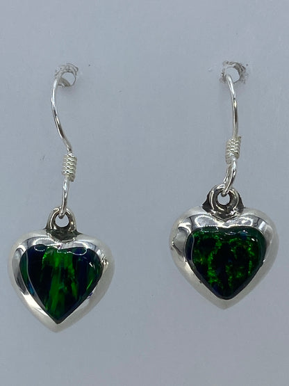 Aretes de 2.3 cm sobre regla de centímetros con certificado de Quinto 925