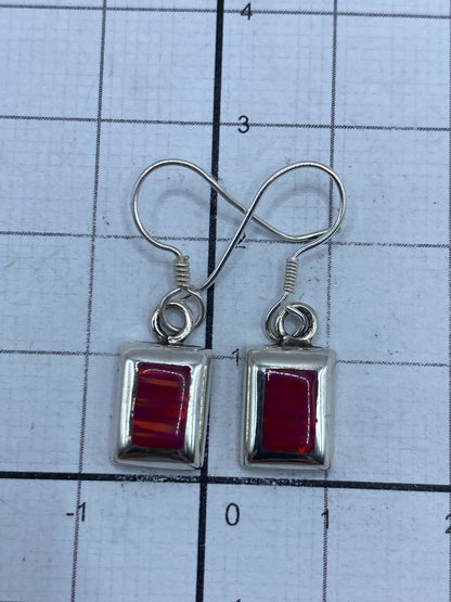 Detalle del Quinto 925 en los aretes, símbolo de autenticidad