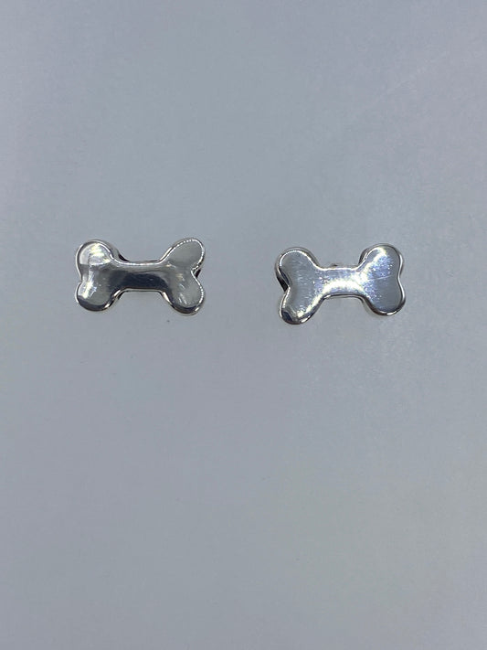 Par de aretes de plata 925 cartoneado en forma de hueso, 1.2 cm de largo