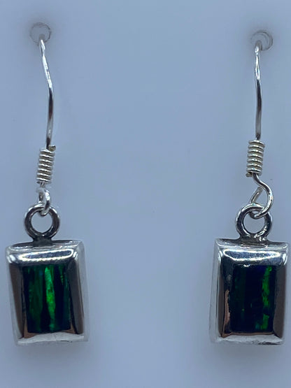 Side view of fire opal earrings with .925 silver hook closure