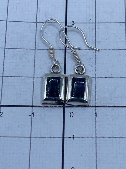 Fire opal earrings displayed on scale showing 1.8 grams total weight