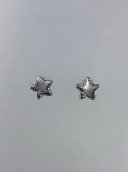 Detalle del cartoneado: volumen y planos de la estrella de plata