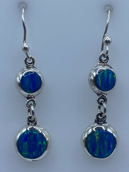 Aretes en escala de centímetros, mostrando largo de 3.6 cm