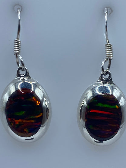 Aretes colgando del anzuelo, vista lateral con toda la longitud de 3.4 cm visible