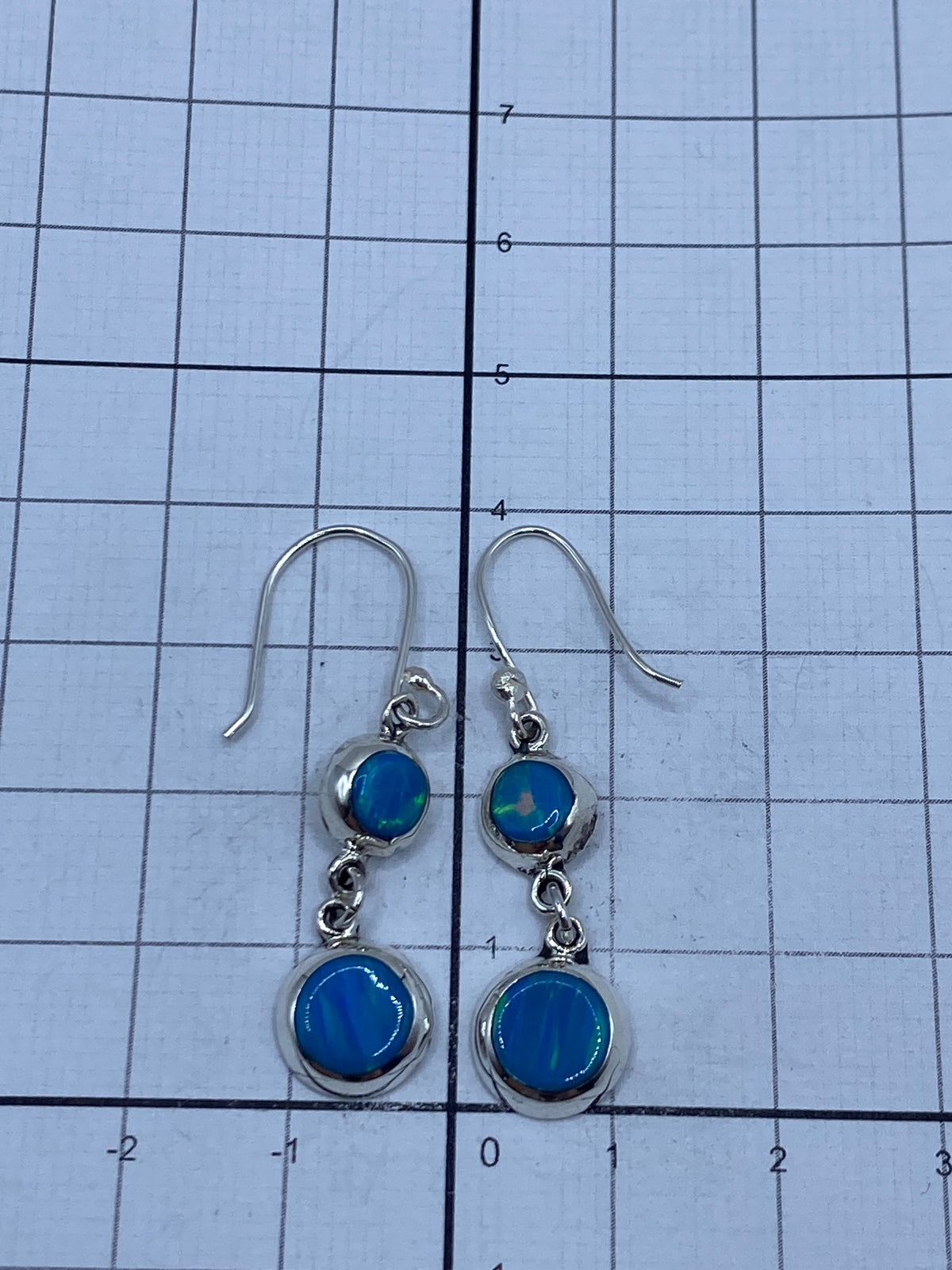 Certificado y peso del par de aretes de plata Taxco 925