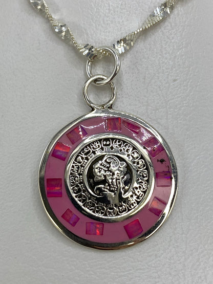 Dije medallón zodiacal en plata 925 con relieve labrado de Taxco, anillas para encadenar