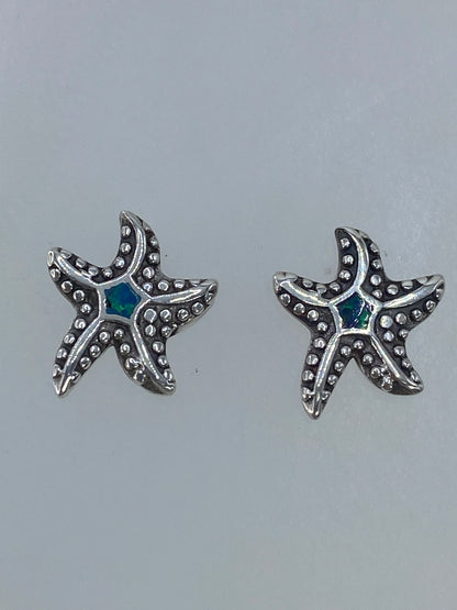 Par de aretes de plata estrella de mar con Ópalo de Fuego verde limón, vista frontal