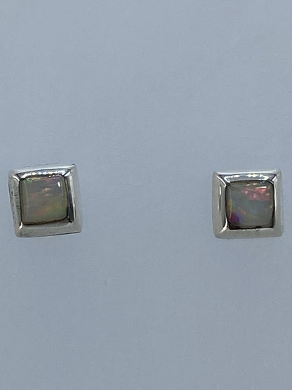 Aretes de plata 925 con piedra natural ópalo de fuego, vista lateral