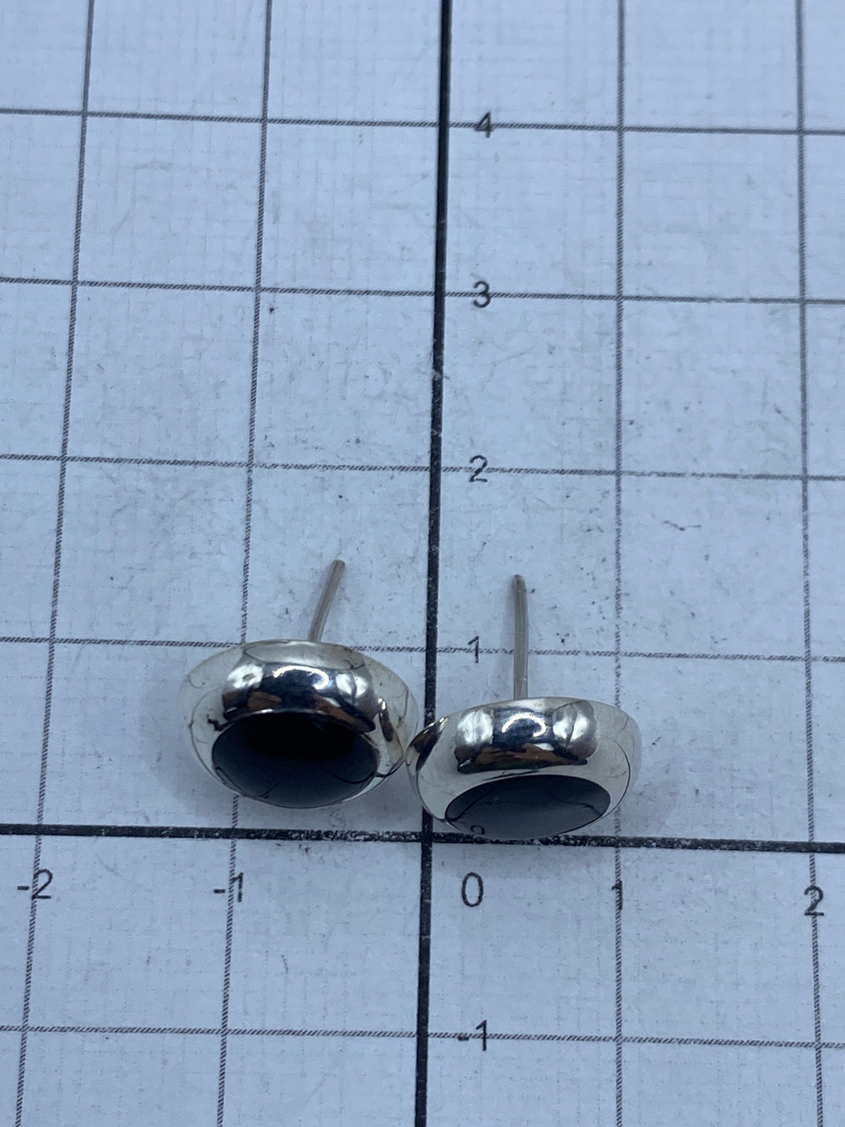 Reverso de los aretes con marca de Quinto 925