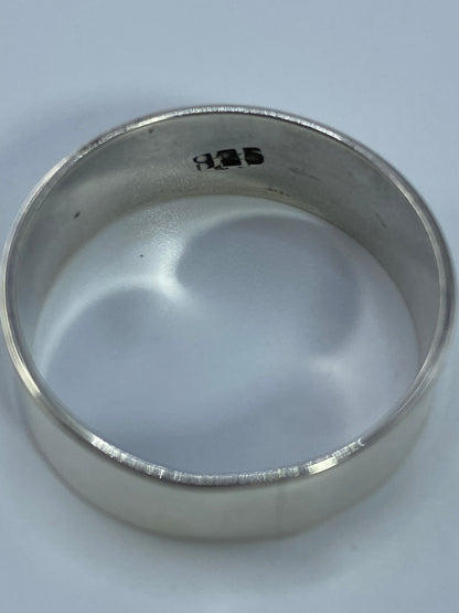 Anillo banda de plata 925 pulido visto desde adentro con marca Quinto 925