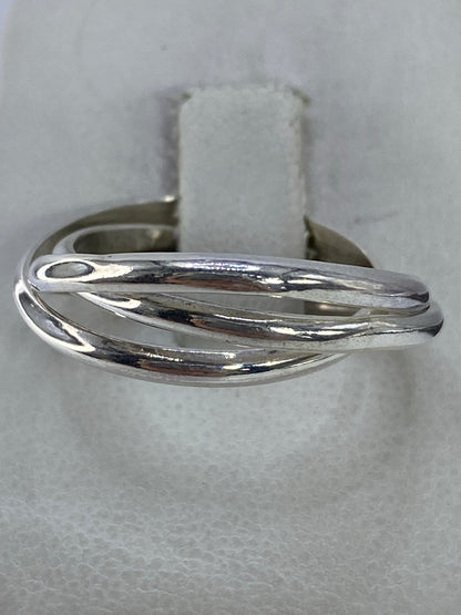 Anillo de plata 925 con 3 bandas cruzadas visto desde arriba