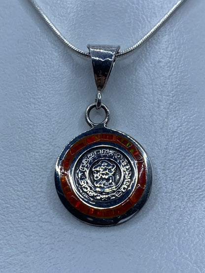 Dije de plata 925 con Calendario Maya e ópalo de fuego naranja engastado