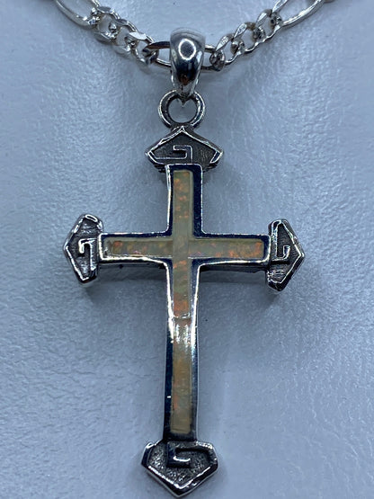 Dije cruz de plata 925 con ópalo de fuego tornasol en cadena plateada