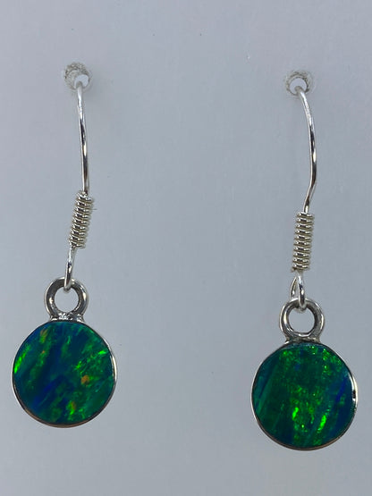 Aretes sobre regla milimétrica indicando largo de 2.7 cm