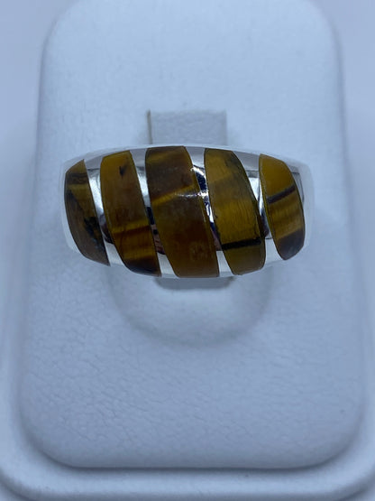 Anillo ancho de plata 925 con cuatro franjas de Ojo de Tigre café, visto desde arriba