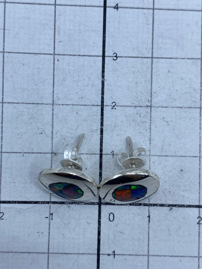 Reverso de los aretes mostrando el Quinto 950 en plata pura