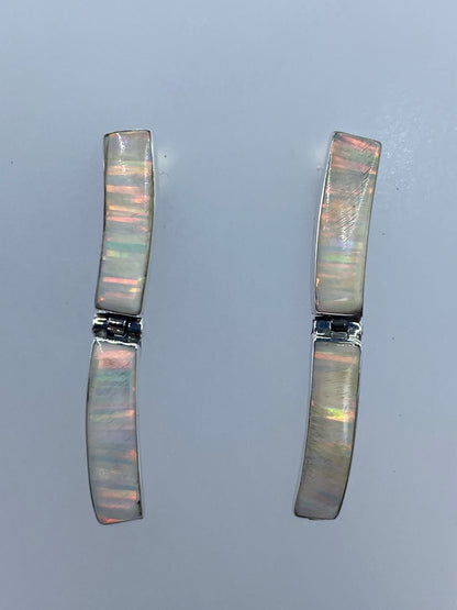 Aretes completos con poste de presión, vista frontal del par