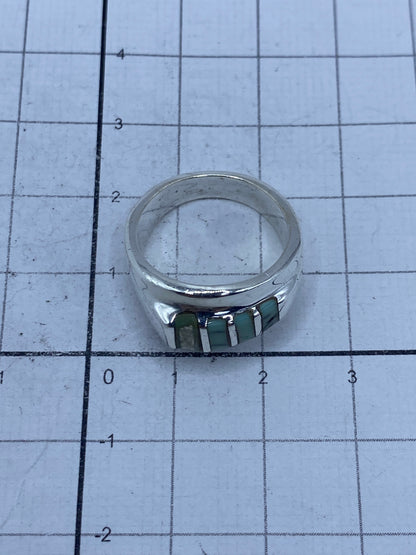 Anillo sobre escala mostrando peso de 9.1 gramos y el Quinto 925