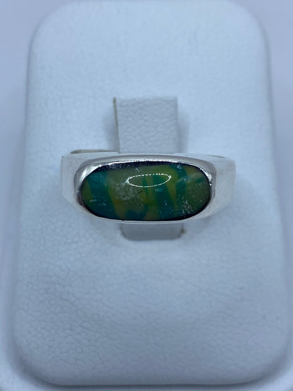 Anillo de plata con turquesa africana multicolor en tonos azul, verde y dorado