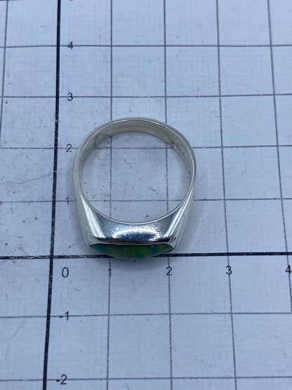 Detalle del engaste a mano y el Quinto 925 grabado en la banda de plata