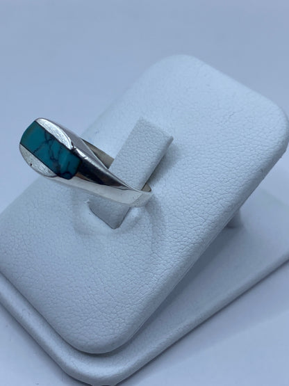 Detalle del engaste a mano de la turquesa en plata 925