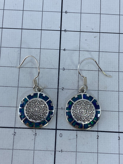 Reverso de los aretes mostrando el hallmark de plata 950 grabado en Taxco