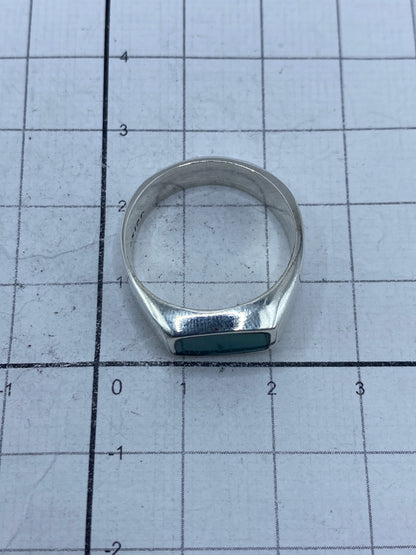 Detalle de la turquesa azul y el Quinto 925 en el interior del anillo