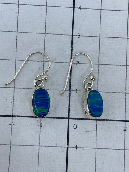 Aretes sobre fondo blanco mostrando el Quinto 950