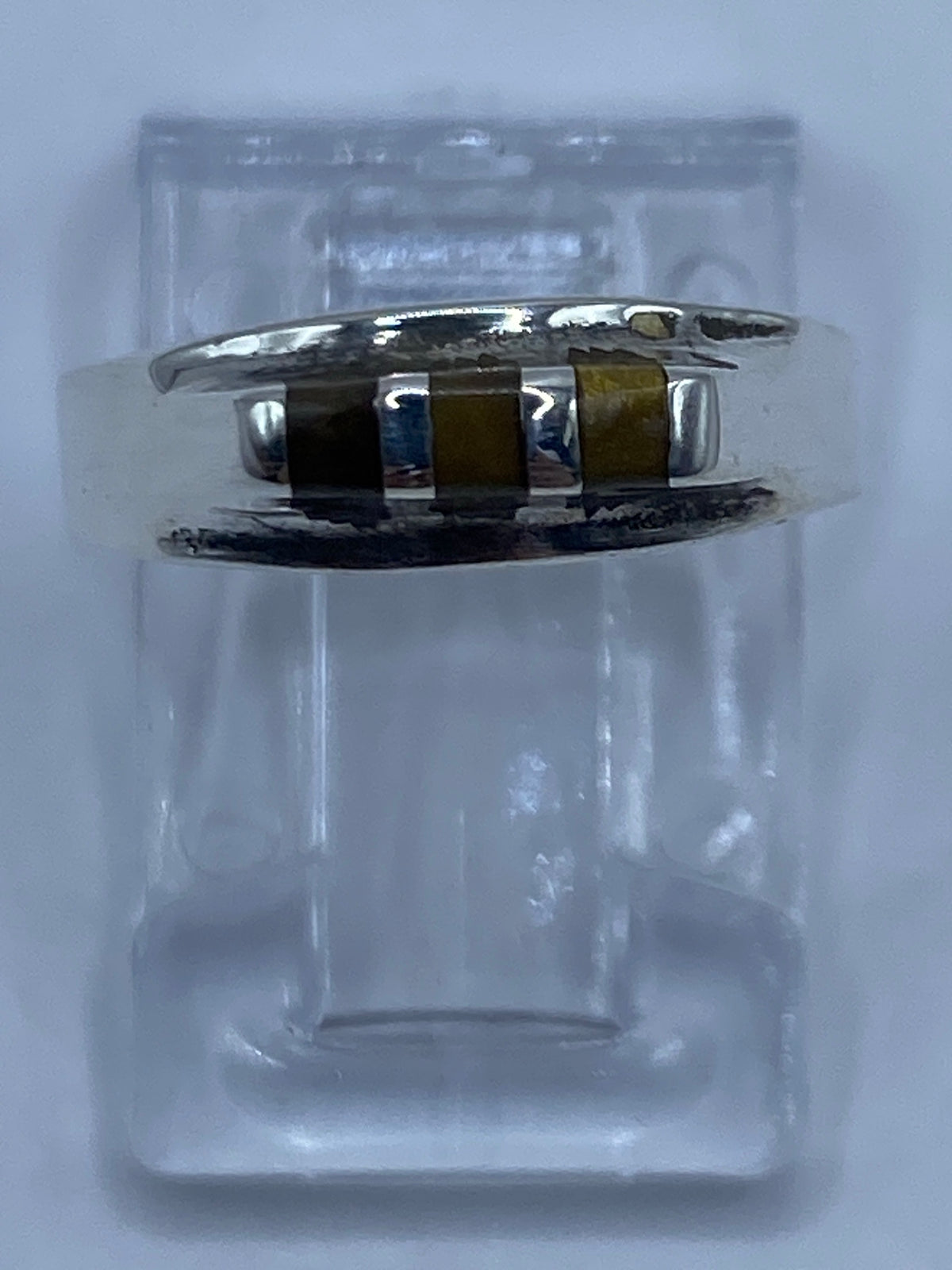 Anillo de plata 925 con ojo de tigre café engastado en el centro