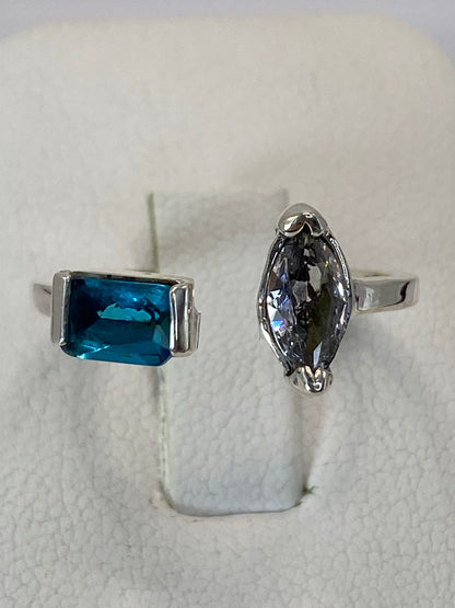 Anillo de plata 925 con circonia azul cielo y multicolor engastada a mano